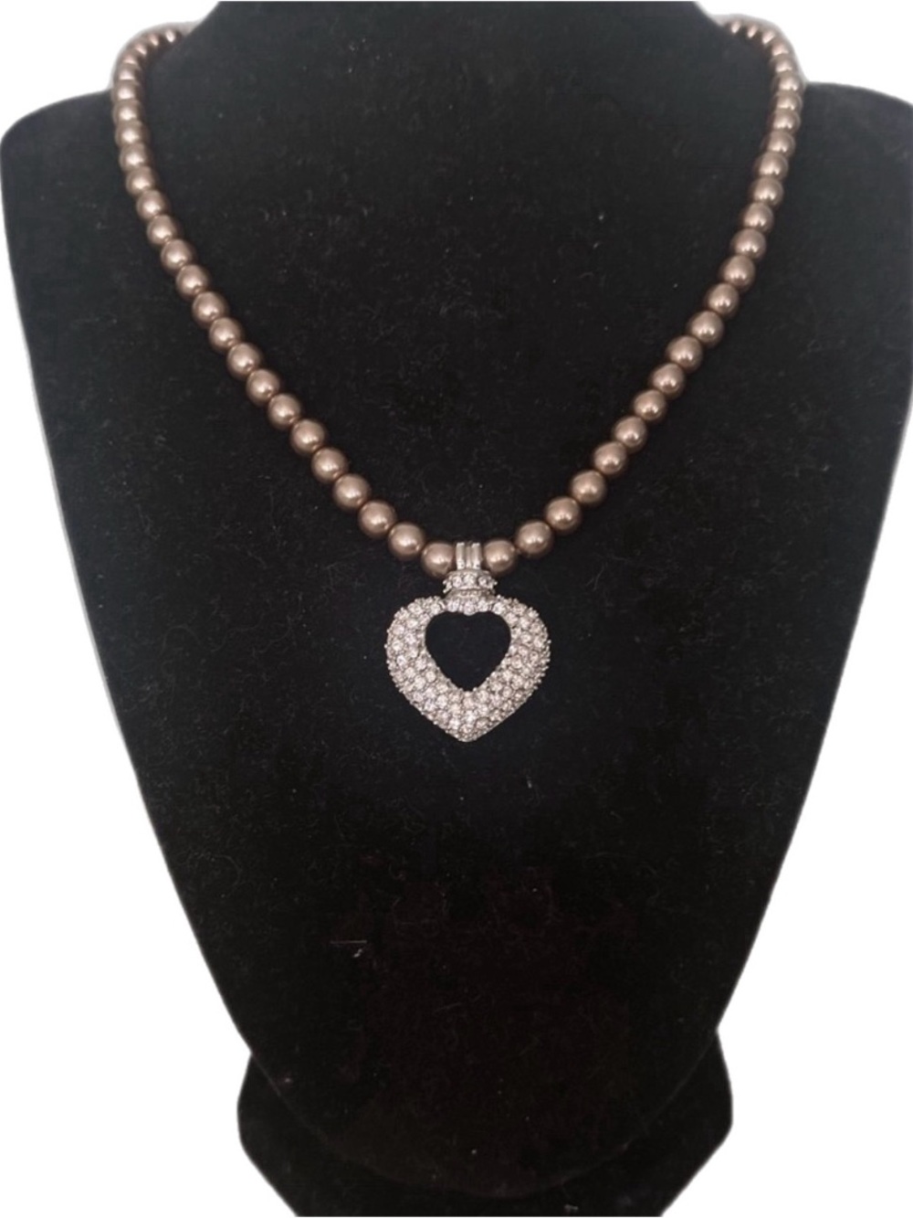 Beautiful champagne pearl necklace with encrusted crystal heart drop.